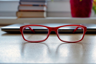 Close-up of eyeglasses on table