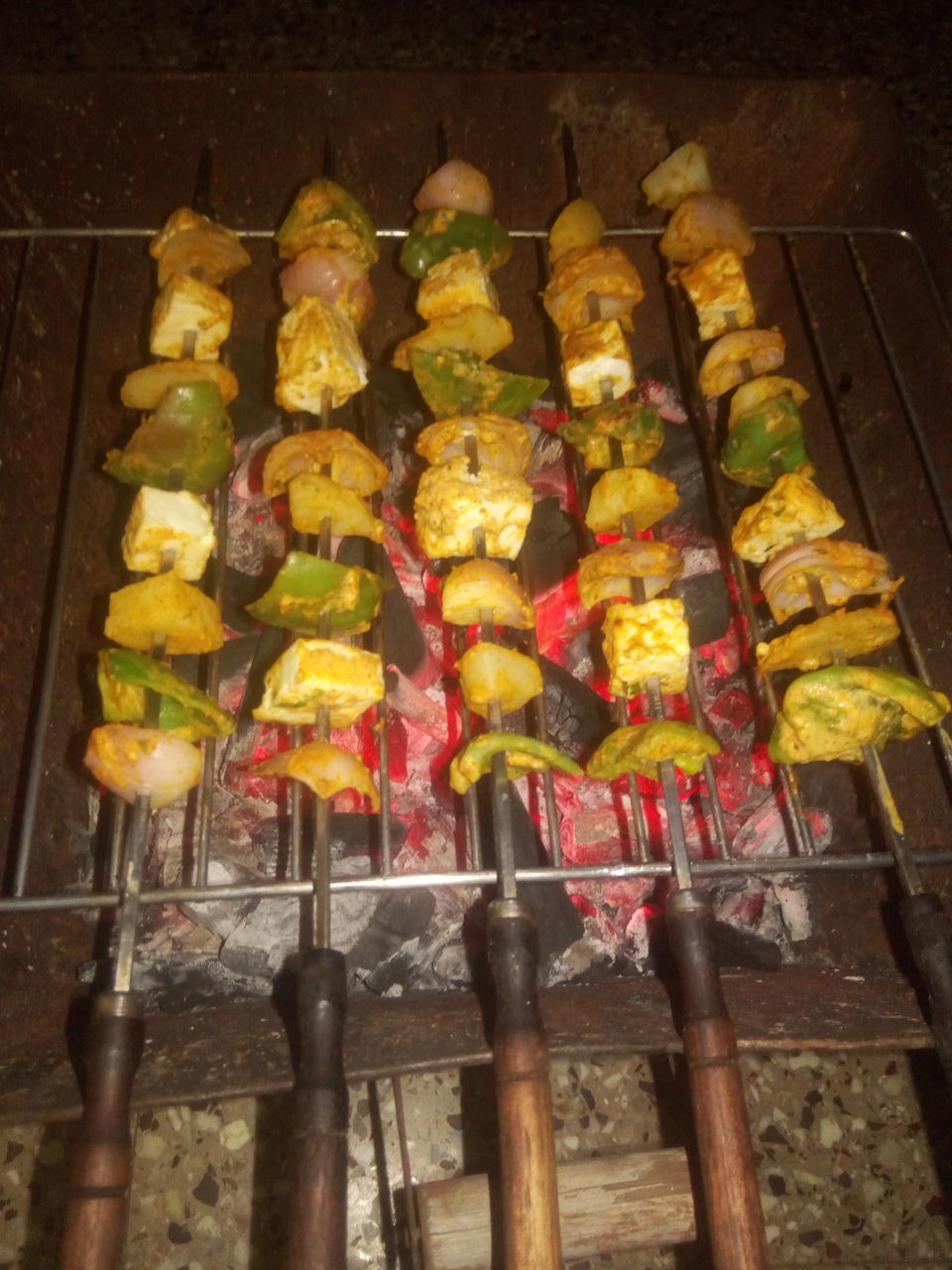 HIGH ANGLE VIEW OF VEGETABLES ON GRILL