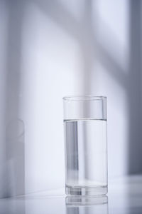 Close-up of glass of water on table