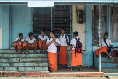 Group of people in front of building