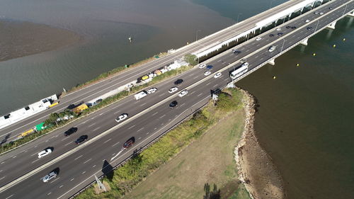 High angle view of cars on street in city