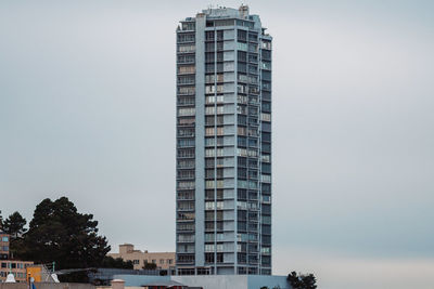 Low angle view of modern building against sky