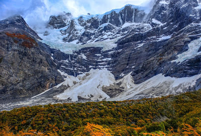 View of the french valley during the full blown colors of autumn patagonia in chile.
