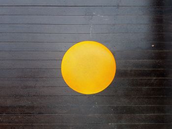 Close-up of yellow table