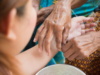 Indigenous community celebrating thread ceremony