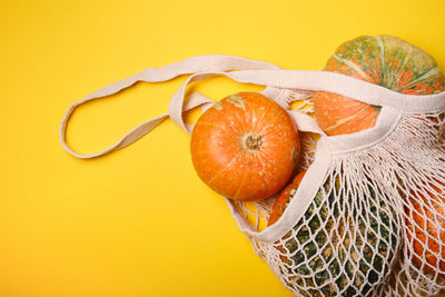 Close-up of orange fruit on table