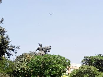 Low angle view of shivaji maharaja statue against clear sky