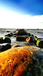 Scenic view of sea against blue sky