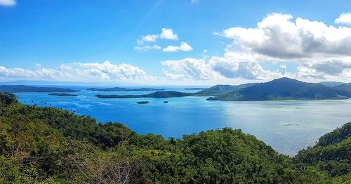 Scenic view of sea against blue sky