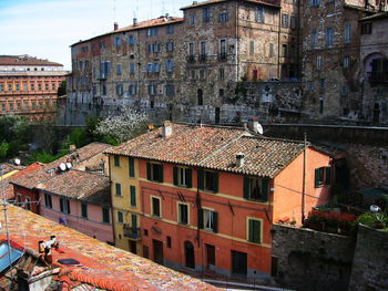 Buildings in city against sky