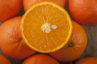 Close-up of fresh oranges on table