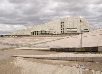 Exterior of building against cloudy sky