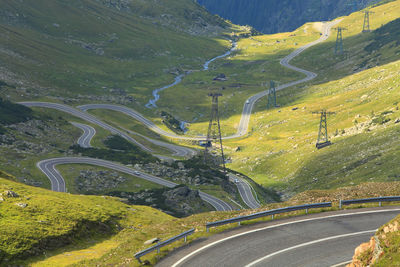 High angle view of winding road on landscape