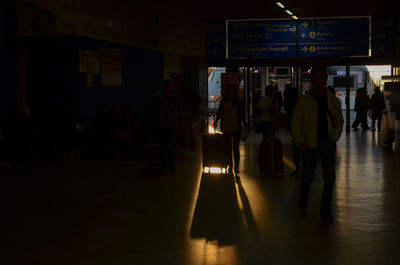 Group of people waiting at airport