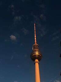 Low angle view of fernsehturm against sky