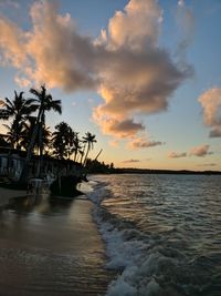 Scenic view of sea against sky at sunset