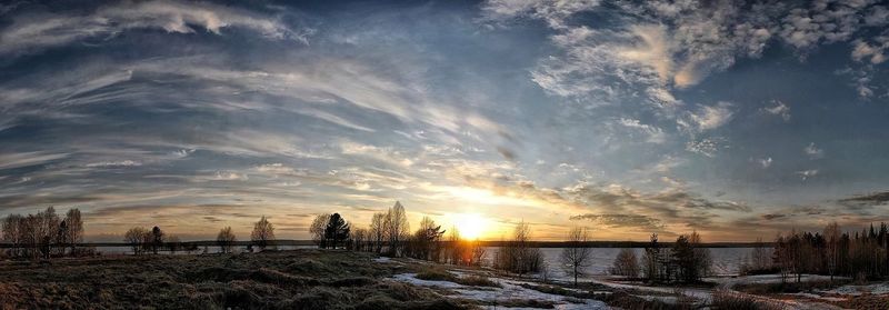 Scenic view of landscape at sunset