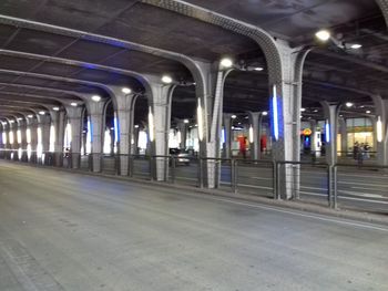 Empty railroad station platform at night