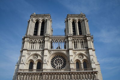 Low angle view of cathedral against sky, notredame