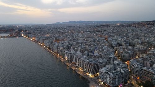 High angle view of river amidst buildings in city