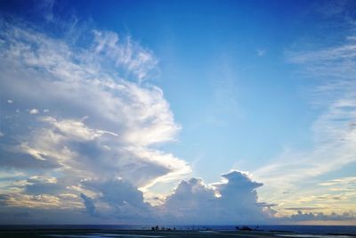 Scenic view of sea against blue sky