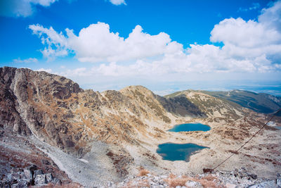 Panoramic view of landscape against cloudy sky