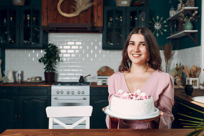 Portrait of a smiling young woman