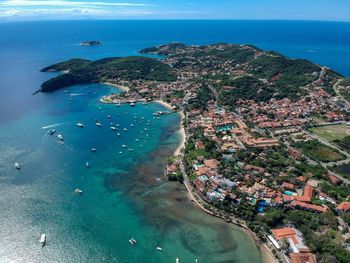 High angle view of city by sea