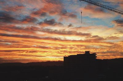 Low angle view of cloudy sky at sunset