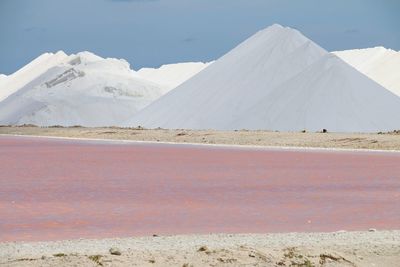 Scenic view of salt mountains against sky