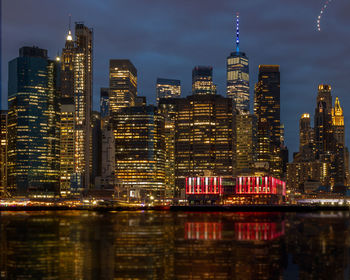 Illuminated buildings in city at night