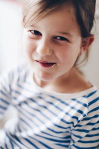 Close-up portrait of smiling girl