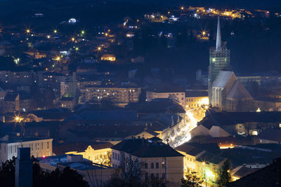 High angle view of city buildings at night