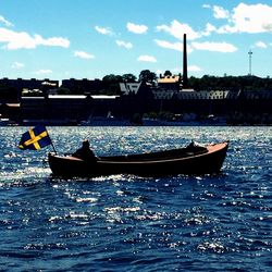 Boats sailing in sea