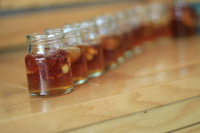 Close-up of glass of jar on table