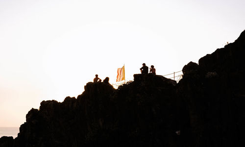 Low angle view of rock formations against clear sky