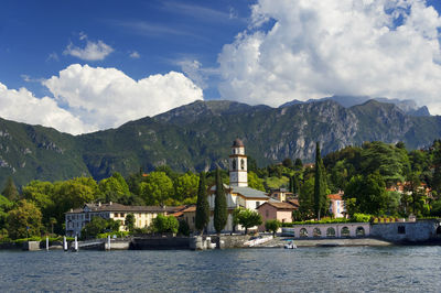 Calm lake against lush foliage