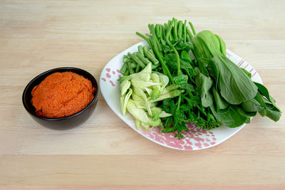 High angle view of vegetables in bowl on table