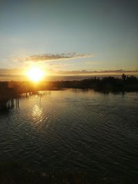 Scenic view of lake during sunset