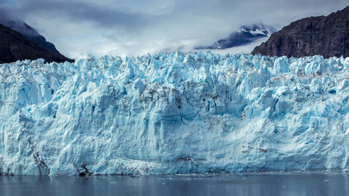 Scenic view of frozen sea against sky