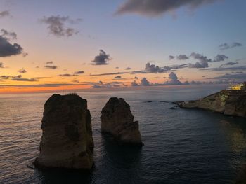 Scenic view of sea against sky at sunset