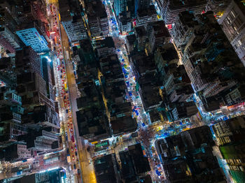 High angle view of illuminated buildings in city