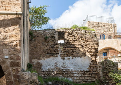Low angle view of historic building against sky