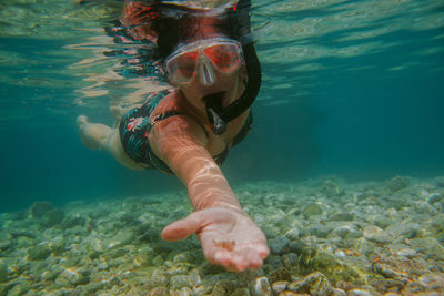 Man swimming in sea