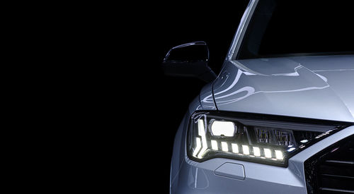 Close-up of car against black background