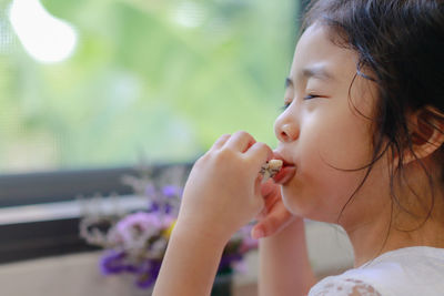 Close-up portrait of cute girl