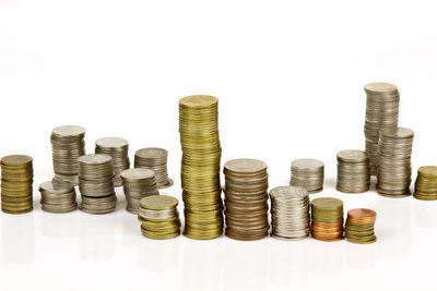 Close-up of stack of objects over white background