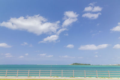 Scenic view of sea against blue sky