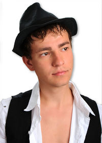 Portrait of boy wearing hat against white background