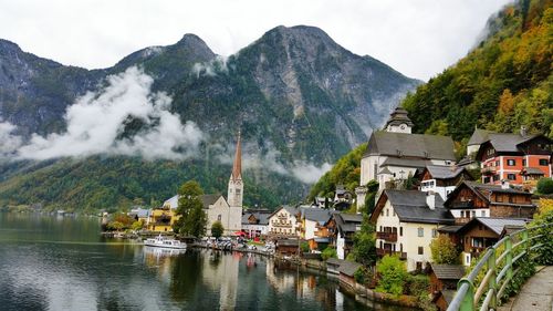 Scenic view of lake and mountains against sky